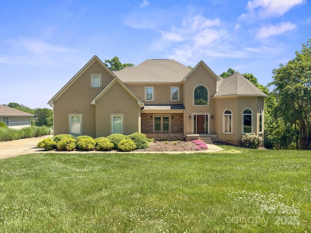 122 Long Cove Ln, Mooresville, NC 28117 - view of front of house with stucco siding and a front yard