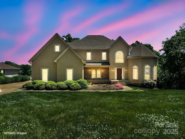 122 Long Cove Ln, Mooresville, NC 28117 - traditional home featuring stucco siding and a front lawn