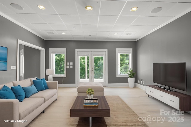 122 Long Cove Ln, Mooresville, NC 28117 - living room featuring baseboards, recessed lighting, light wood finished floors, and ornamental molding
