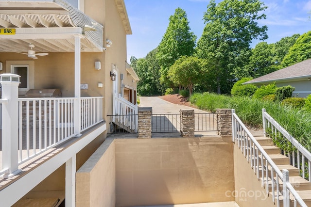 122 Long Cove Ln, Mooresville, NC 28117 - view of patio featuring stairs and a ceiling fan