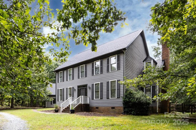 6511 Buggy Whip Ln, Waxhaw, NC 28173 - colonial-style house featuring crawl space, roof with shingles, and a chimney