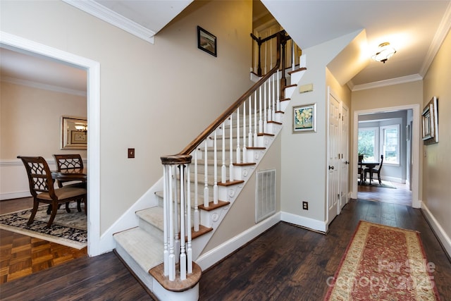 6511 Buggy Whip Ln, Waxhaw, NC 28173 - stairway with crown molding and wood finished floors