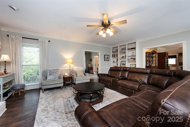 6511 Buggy Whip Ln, Waxhaw, NC 28173 - living room featuring crown molding, a ceiling fan, dark wood finished floors, and built in shelves