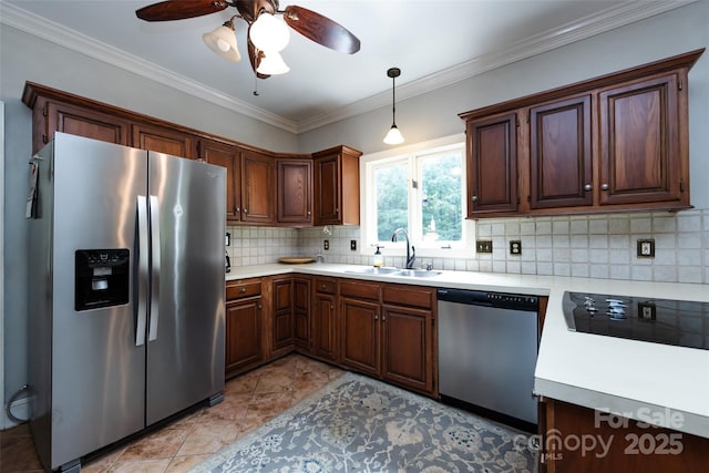 6511 Buggy Whip Ln, Waxhaw, NC 28173 - kitchen featuring appliances with stainless steel finishes, light countertops, decorative backsplash, a ceiling fan, and ornamental molding
