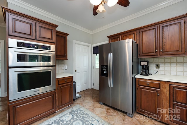 6511 Buggy Whip Ln, Waxhaw, NC 28173 - kitchen featuring stainless steel appliances, a ceiling fan, tasteful backsplash, ornamental molding, and light countertops