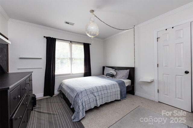 6511 Buggy Whip Ln, Waxhaw, NC 28173 - carpeted bedroom featuring crown molding and baseboards