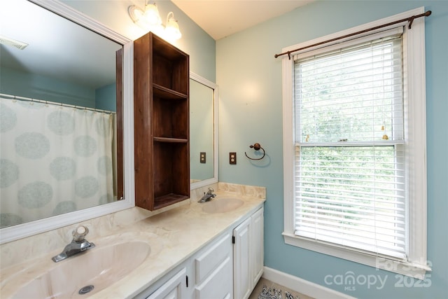 6511 Buggy Whip Ln, Waxhaw, NC 28173 - full bathroom featuring double vanity and baseboards