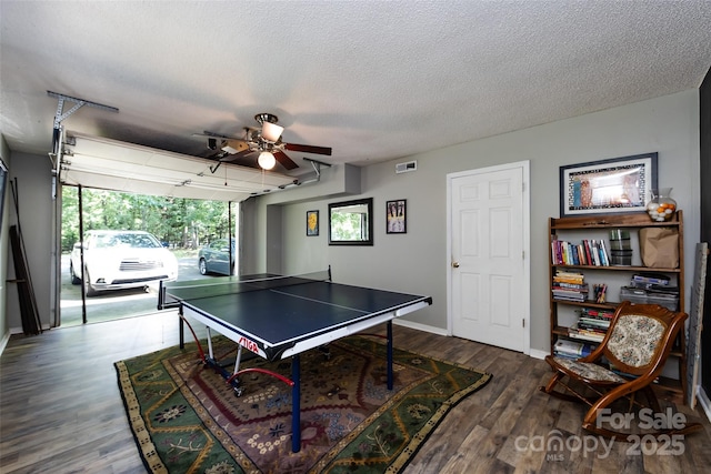 6511 Buggy Whip Ln, Waxhaw, NC 28173 - playroom with a ceiling fan, wood finished floors, and a textured ceiling