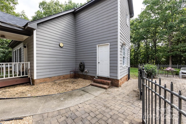 6511 Buggy Whip Ln, Waxhaw, NC 28173 - view of exterior entry featuring a patio