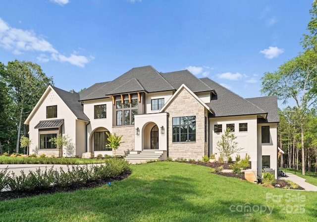 15037 June Washam Rd, Davidson, NC 28036 - french country home featuring stone siding, a front lawn, a shingled roof, and stucco siding