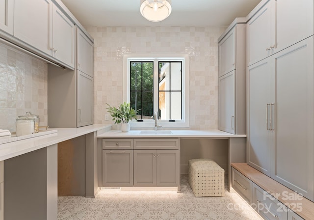 15037 June Washam Rd, Davidson, NC 28036 - kitchen with tasteful backsplash, gray cabinets, and light countertops