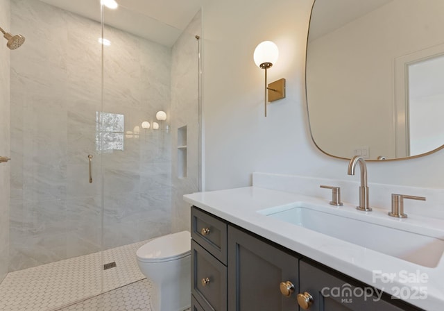 15037 June Washam Rd, Davidson, NC 28036 - full bath featuring vanity, a stall shower, and tile patterned flooring