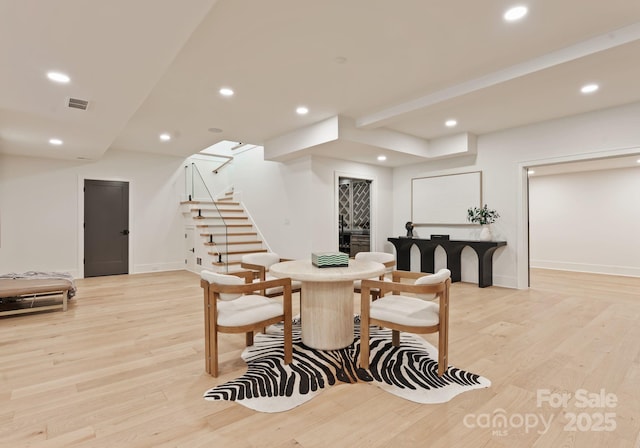 15037 June Washam Rd, Davidson, NC 28036 - dining space with recessed lighting, stairway, light wood-style floors, and bar area
