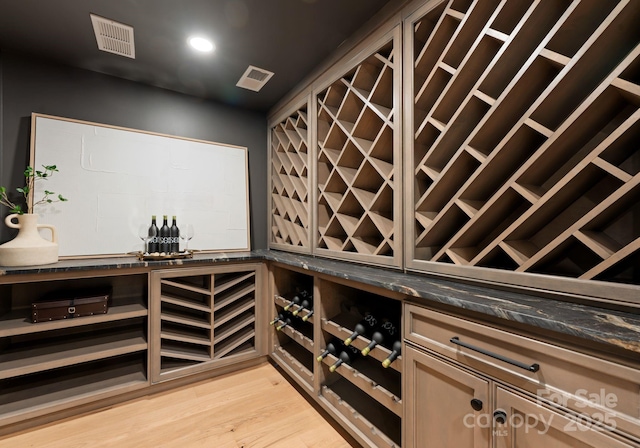 15037 June Washam Rd, Davidson, NC 28036 - wine area featuring light wood-type flooring