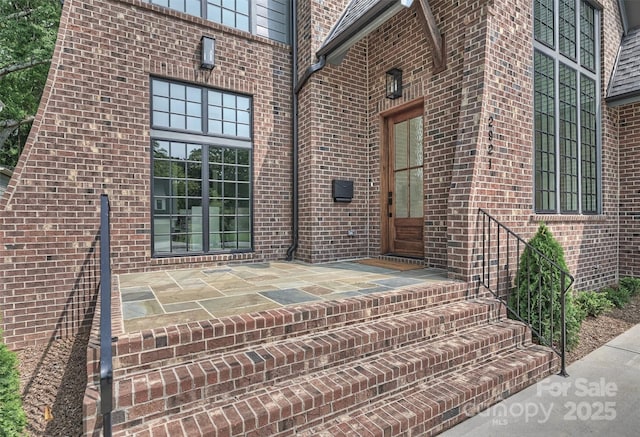2921 Windsor Ave, Charlotte, NC 28209 - doorway to property featuring brick siding
