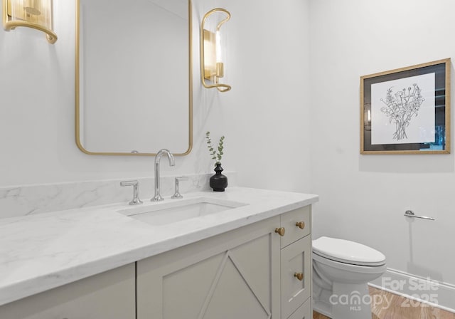 2921 Windsor Ave, Charlotte, NC 28209 - bathroom featuring vanity and wood finished floors