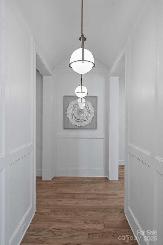 2921 Windsor Ave, Charlotte, NC 28209 - corridor with wood finished floors and vaulted ceiling