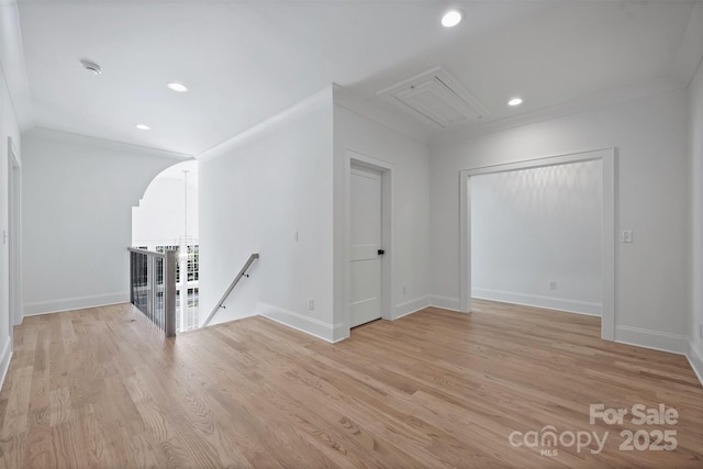 2921 Windsor Ave, Charlotte, NC 28209 - unfurnished room featuring attic access, light wood-style floors, recessed lighting, a smoke detector, and crown molding