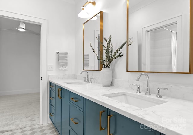 2921 Windsor Ave, Charlotte, NC 28209 - full bathroom featuring double vanity and baseboards