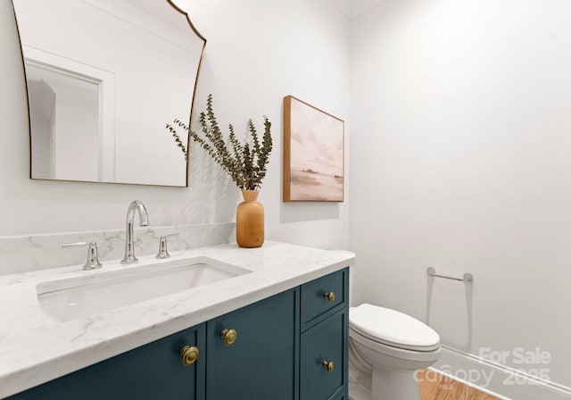 2921 Windsor Ave, Charlotte, NC 28209 - bathroom with vanity and wood finished floors