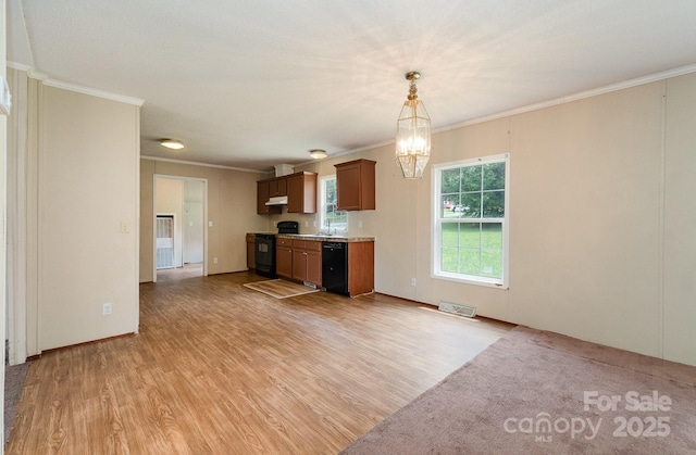 828 Carver St Unit 17-19, Shelby, NC 28152 - kitchen featuring black appliances, a chandelier, under cabinet range hood, light wood-style flooring, and crown molding