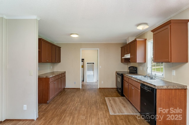 828 Carver St Unit 17-19, Shelby, NC 28152 - kitchen featuring black appliances, light wood-style floors, crown molding, under cabinet range hood, and brown cabinets