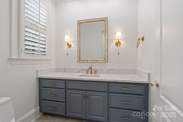 2954 Reynolds Sq, Winston Salem, NC 27106 - bathroom featuring vanity, toilet, and baseboards