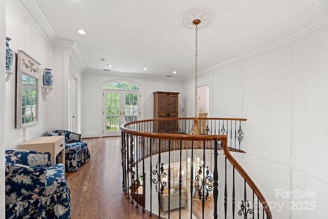 2954 Reynolds Sq, Winston Salem, NC 27106 - hallway featuring an upstairs landing, a decorative wall, ornamental molding, wood finished floors, and recessed lighting