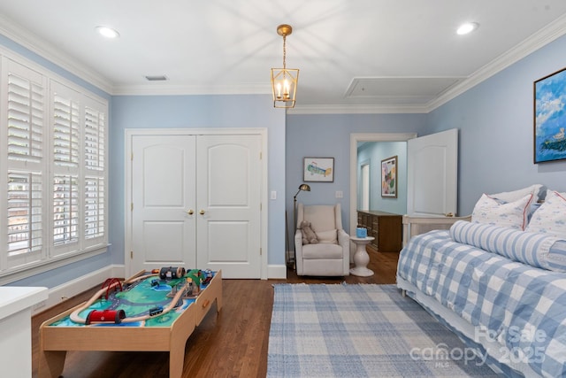 2954 Reynolds Sq, Winston Salem, NC 27106 - bedroom with attic access, multiple windows, wood finished floors, crown molding, and a closet