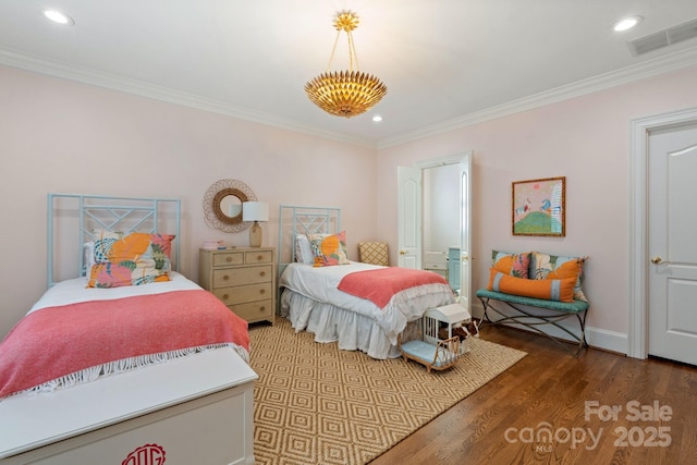 2954 Reynolds Sq, Winston Salem, NC 27106 - bedroom with ornamental molding, wood finished floors, recessed lighting, and baseboards