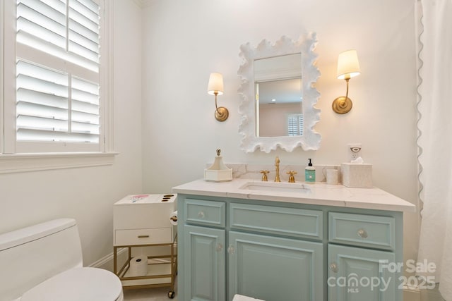 2954 Reynolds Sq, Winston Salem, NC 27106 - bathroom with toilet, vanity, and plenty of natural light