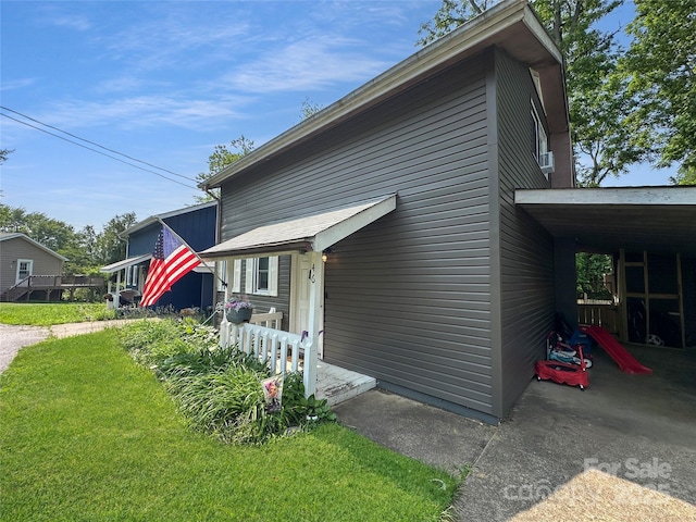 46 Westbrook Cir, Clyde, NC 28721 - view of side of home with a lawn