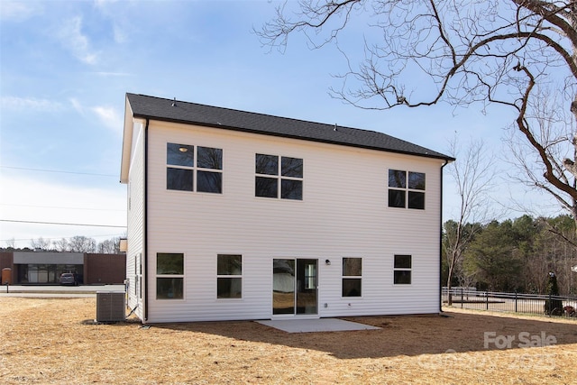 118 Durham Rd, Stanley, NC 28164 - rear view of house with central AC and a patio