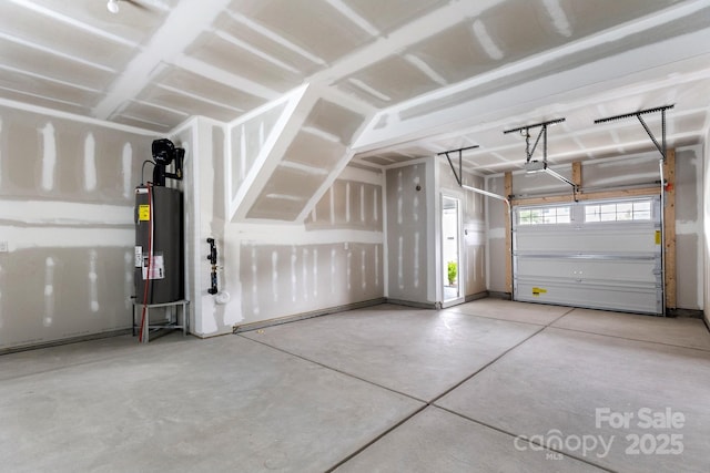 15034 Scoter St, Charlotte, NC 28262 - garage featuring water heater and a garage door opener
