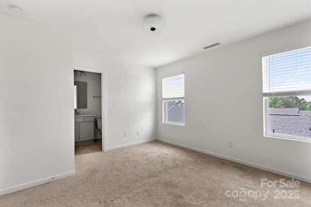 15034 Scoter St, Charlotte, NC 28262 - empty room featuring carpet flooring, baseboards, and a smoke detector