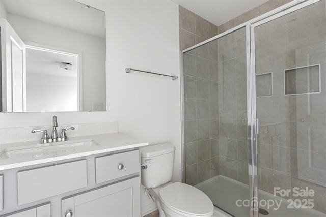 15034 Scoter St, Charlotte, NC 28262 - bathroom with vanity, toilet, and a stall shower