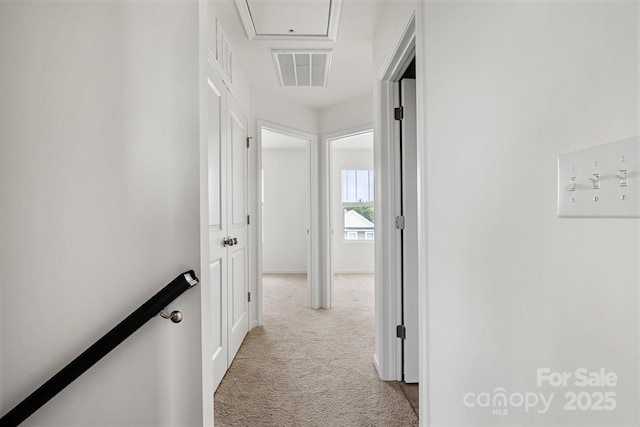 15034 Scoter St, Charlotte, NC 28262 - hall featuring carpet floors, baseboards, and an upstairs landing