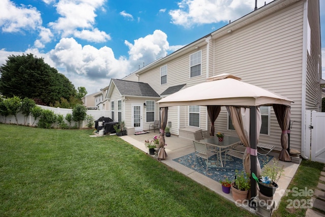 3351 Streamside Dr, Davidson, NC 28036 - rear view of house featuring a gazebo, a patio area, and a fenced backyard