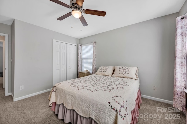 3351 Streamside Dr, Davidson, NC 28036 - carpeted bedroom featuring a closet and a ceiling fan