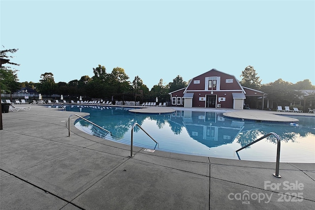 3351 Streamside Dr, Davidson, NC 28036 - community pool with a patio area