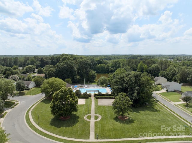 1003 Snake River Ct, Monroe, NC 28110 - bird's eye view of a pool area and a forest
