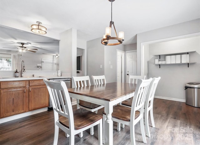 1003 Snake River Ct, Monroe, NC 28110 - dining room featuring dark wood-style floors, a chandelier, and a ceiling fan