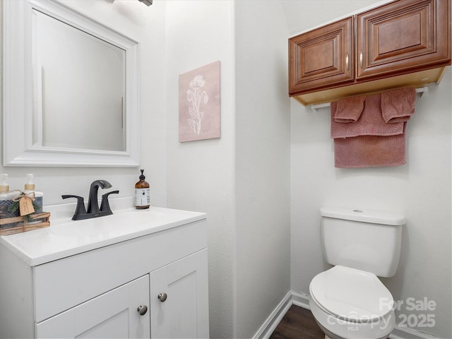 1003 Snake River Ct, Monroe, NC 28110 - half bathroom with vanity and wood finished floors