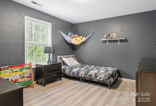 1003 Snake River Ct, Monroe, NC 28110 - bedroom with light wood finished floors