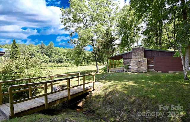 2967 Roby Martin Rd, Lenoir, NC 28645 - view of green lawn with a wooden deck