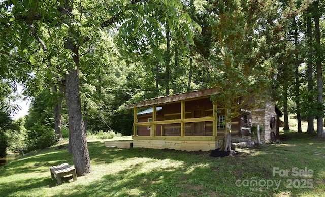 2967 Roby Martin Rd, Lenoir, NC 28645 - back of property featuring a lawn and an outdoor structure