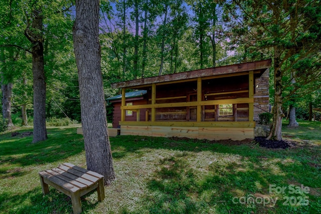 2967 Roby Martin Rd, Lenoir, NC 28645 - back of house with a lawn and stone siding