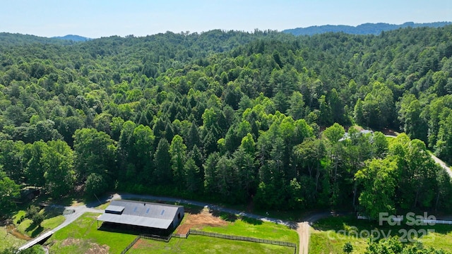 2967 Roby Martin Rd, Lenoir, NC 28645 - drone / aerial view of a heavily wooded area and a mountain backdrop