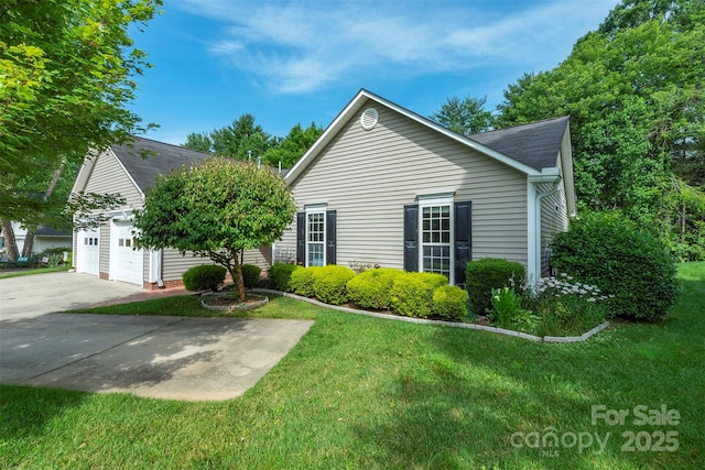 16 Red Barn Ln, Fletcher, NC 28732 - view of side of property featuring a lawn, roof with shingles, and driveway