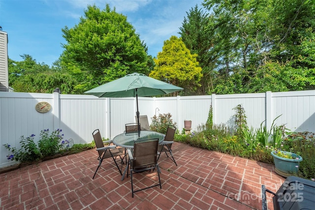16 Red Barn Ln, Fletcher, NC 28732 - fenced backyard featuring a patio area and outdoor dining space